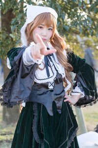 Rating: Safe Score: 0 Tags: 1girl 3d bangs blonde_hair blue_eyes blurry blurry_background blurry_foreground depth_of_field dress long_hair looking_at_viewer nun outdoors solo suiseiseki User: admin