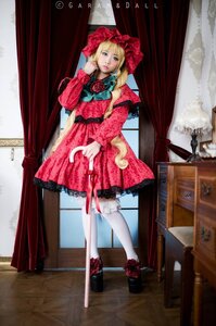 Rating: Safe Score: 0 Tags: 1girl blonde_hair blue_eyes closed_umbrella curtains dress flower pantyhose red_dress rose shinku shoes solo umbrella white_legwear window User: admin