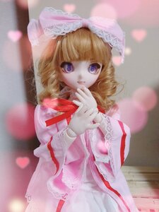Rating: Safe Score: 0 Tags: 1girl bangs blonde_hair blue_eyes blurry bow depth_of_field doll dress drill_hair frills heart hinaichigo long_sleeves looking_at_viewer petals photo pink_bow pink_dress purple_eyes ribbon solo User: admin