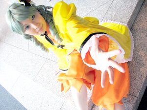 Rating: Safe Score: 0 Tags: 1girl dress drill_hair flower hair_flower hair_ornament kanaria outstretched_arm outstretched_hand smile solo twin_drills User: admin