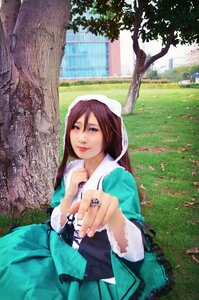 Rating: Safe Score: 0 Tags: 1girl brown_hair dress grass green_dress green_eyes head_scarf lips long_hair outdoors solo suiseiseki tree User: admin