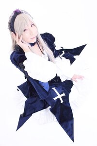 Rating: Safe Score: 0 Tags: 1girl bangs choker closed_mouth dress frills hairband long_hair long_sleeves looking_at_viewer sitting smile solo suigintou white_background User: admin