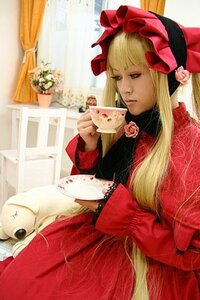 Rating: Safe Score: 0 Tags: 1girl blonde_hair blue_eyes bonnet bow cup curtains dress flower long_hair long_sleeves pink_flower pink_rose red_dress rose shinku sitting solo stuffed_animal teacup window User: admin