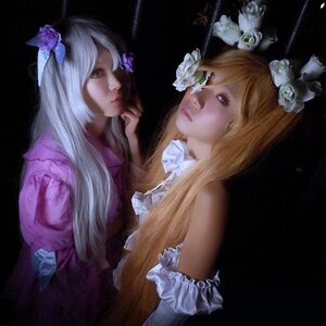 Rating: Safe Score: 0 Tags: 2girls black_background blonde_hair dress elbow_gloves flower hair_flower hair_ornament lips long_hair multiple_cosplay multiple_girls realistic tagme User: admin