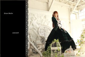 Rating: Safe Score: 0 Tags: 1girl black_dress brown_hair building dress long_hair long_sleeves looking_at_viewer solo standing suiseiseki User: admin