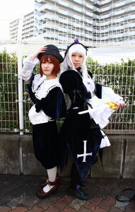 Rating: Safe Score: 0 Tags: 2girls back-to-back bangs black_dress brown_eyes brown_hair building dress hat long_hair long_sleeves looking_at_viewer mary_janes multiple_cosplay multiple_girls outdoors red_eyes shoes standing tagme white_hair white_legwear User: admin