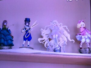 Rating: Safe Score: 0 Tags: 3girls blurry blurry_foreground depth_of_field doll dress hat long_hair multiple_dolls multiple_girls short_hair tagme weapon User: admin