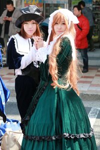 Rating: Safe Score: 0 Tags: 2girls 3d 91076 blonde_hair blurry blurry_background blurry_foreground brown_hair depth_of_field dress green_dress hat long_hair looking_at_viewer multiple_cosplay multiple_girls necklace photo smile standing tagme User: admin