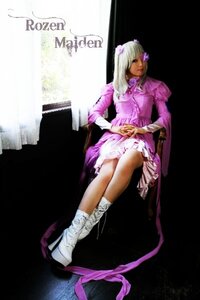 Rating: Safe Score: 0 Tags: 1girl barasuishou crossed_legs dark_skin dress flower frills hair_flower hair_ornament long_hair long_sleeves sitting solo User: admin