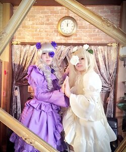 Rating: Safe Score: 0 Tags: 2girls blonde_hair blue_flower dress eyepatch flower hair_flower hair_ornament lips long_hair mirror multiple_cosplay multiple_girls purple_dress reflection rose tagme User: admin