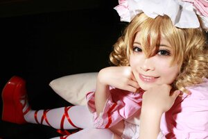 Rating: Safe Score: 0 Tags: 1girl black_eyes blonde_hair bow dress drill_hair grey_eyes hat hinaichigo lips looking_at_viewer lying ribbon shoes smile solo teeth wings User: admin