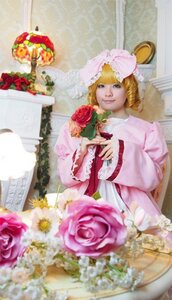 Rating: Safe Score: 0 Tags: 1girl blonde_hair blue_eyes blurry bouquet chair depth_of_field dress flower frills hat hinaichigo pink_dress pink_flower pink_rose red_flower red_rose rose smile solo User: admin
