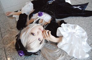 Rating: Safe Score: 0 Tags: 1girl black_dress dress flower frills gothic_lolita lips lolita_fashion long_hair long_sleeves looking_at_viewer lying purple_eyes purple_rose rose silver_hair solo suigintou white_hair User: admin