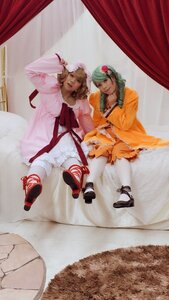 Rating: Safe Score: 0 Tags: 2girls curtains dress flower green_hair hair_flower hair_ornament multiple_cosplay multiple_girls realistic shoes short_hair striped_legwear tagme window User: admin