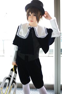 Rating: Safe Score: 0 Tags: 1girl bicycle brown_hair capelet ground_vehicle hat long_sleeves looking_at_viewer short_hair solo souseiseki standing top_hat User: admin
