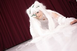 Rating: Safe Score: 0 Tags: 1girl curtains indoors kirakishou long_hair looking_at_viewer sitting solo veil white_hair window User: admin