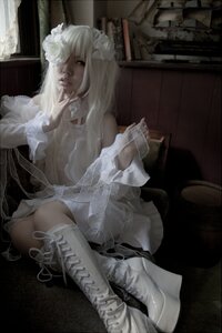 Rating: Safe Score: 0 Tags: 1girl 3d blonde_hair boots choker dress hair_ornament kirakishou lips long_hair realistic see-through sitting solo white_footwear User: admin