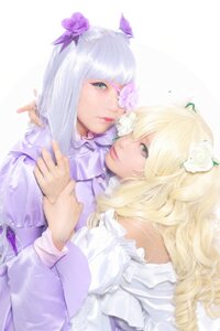 Rating: Safe Score: 0 Tags: 2girls 91076 blonde_hair dress eyepatch flower frills green_eyes hair_flower hair_ornament lips long_hair multiple_cosplay multiple_girls rose smile striped tagme User: admin
