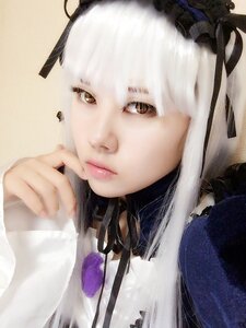 Rating: Safe Score: 0 Tags: 1girl bangs black_ribbon brown_eyes choker closed_mouth feathers lips looking_at_viewer ribbon solo suigintou white_hair User: admin