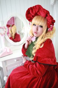 Rating: Safe Score: 0 Tags: 1girl blonde_hair blue_eyes blurry blurry_background bonnet depth_of_field dress figure flower lips long_hair long_sleeves photo realistic red_dress rose shinku solo User: admin