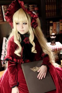 Rating: Safe Score: 0 Tags: 1girl bangs blonde_hair blue_eyes book bookshelf dress flower holding lips long_hair looking_at_viewer red_dress rose shinku solo User: admin