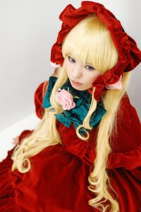 Rating: Safe Score: 0 Tags: 1girl bangs blonde_hair blue_eyes bonnet bow dress flower grey_background lips long_hair long_sleeves looking_at_viewer red_dress rose shinku simple_background sitting solo very_long_hair User: admin