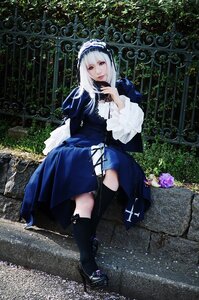 Rating: Safe Score: 0 Tags: 1girl bangs black_footwear black_legwear blue_dress boots dress flower hairband long_hair long_sleeves looking_at_viewer rose sitting solo suigintou User: admin