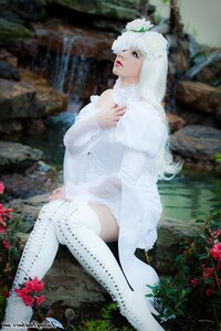 Rating: Safe Score: 0 Tags: 1girl artist_name blurry dress flower kirakishou lips long_hair outdoors sitting solo sweater thighhighs white_hair white_legwear User: admin