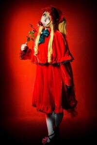 Rating: Safe Score: 0 Tags: 1girl blonde_hair blue_eyes bonnet bow dress flower full_body long_hair long_sleeves red_background red_dress red_flower red_rose rose shinku solo standing User: admin