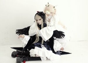 Rating: Safe Score: 0 Tags: 2girls angel_wings bird black_wings blonde_hair crow dress feathers flower frills long_hair multiple_cosplay multiple_girls siblings sitting suigintou tagme wings User: admin