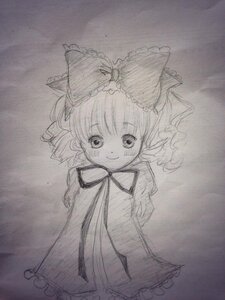 Rating: Safe Score: 0 Tags: 1girl bow eyebrows_visible_through_hair frills graphite_(medium) greyscale hair_bow hinaichigo image kagiyama_hina looking_at_viewer monochrome photo smile solo traditional_media User: admin