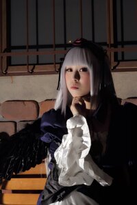 Rating: Safe Score: 0 Tags: 1girl bangs blunt_bangs closed_mouth dress indoors lips long_hair looking_at_viewer nose sitting solo suigintou User: admin