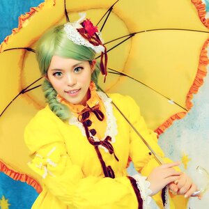 Rating: Safe Score: 0 Tags: 1girl flower frilled_pillow frills green_hair hair_ornament holding_umbrella kanaria lips parasol smile solo umbrella User: admin