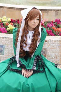 Rating: Safe Score: 0 Tags: 1girl brown_hair dress flower green_dress hair_over_one_eye lips long_hair sitting solo suiseiseki v_arms User: admin
