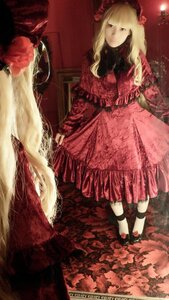 Rating: Safe Score: 0 Tags: 1girl bangs blonde_hair blunt_bangs curtains dress flower long_hair looking_at_viewer red_dress red_theme shinku sitting solo User: admin