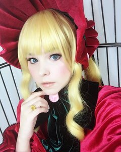 Rating: Safe Score: 0 Tags: 1girl bangs blonde_hair blue_eyes bow candy eyelashes food lips lollipop long_hair looking_at_viewer shinku solo User: admin