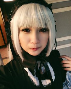 Rating: Safe Score: 0 Tags: 1girl bangs brown_eyes closed_mouth lace lips looking_at_viewer photo portrait red_eyes ribbon solo suigintou white_hair User: admin