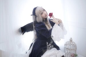 Rating: Safe Score: 0 Tags: 1girl blonde_hair breasts cleavage dress feathers flower holding_flower lips long_hair long_sleeves necklace ribbon rose solo suigintou wings User: admin