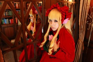 Rating: Safe Score: 0 Tags: 1girl blonde_hair blue_eyes bonnet bookshelf bow curtains dress flower indoors long_hair long_sleeves shinku solo table User: admin