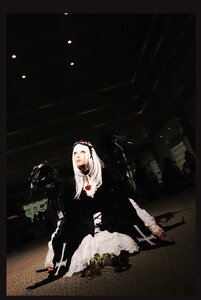 Rating: Safe Score: 0 Tags: black_background dress long_hair pale_skin solo suigintou weapon white_hair User: admin