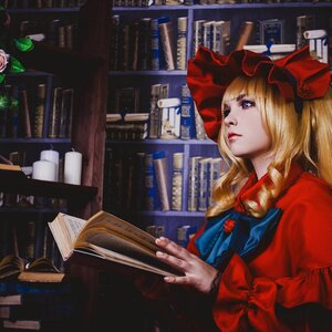 Rating: Safe Score: 0 Tags: 1girl blonde_hair blue_eyes book bookshelf bow hat hat_ribbon library lips long_hair ribbon shinku solo traditional_media User: admin