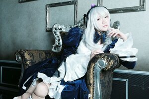 Rating: Safe Score: 0 Tags: 1girl 3d dress frills gothic_lolita hairband long_hair long_sleeves ribbon sitting solo suigintou white_hair wings User: admin