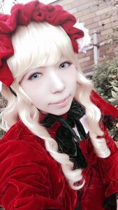 Rating: Safe Score: 0 Tags: 1girl bangs blonde_hair blue_eyes bow closed_mouth eyelashes lips long_hair looking_at_viewer outdoors shinku smile solo upper_body User: admin