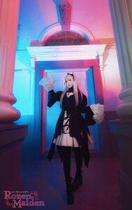 Rating: Safe Score: 0 Tags: 1girl black_dress black_legwear curtains dress indoors jacket long_hair pink_hair solo standing suigintou User: admin