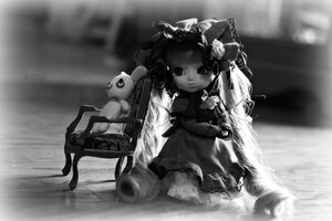 Rating: Safe Score: 0 Tags: 1girl bow doll dress frilled_dress frills greyscale hair_bow lolita_fashion long_hair monochrome outdoors shinku sitting solo stuffed_animal teddy_bear very_long_hair User: admin