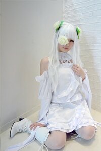 Rating: Safe Score: 0 Tags: 1girl bare_shoulders boots dress eyepatch flower hair_ornament hand_on_own_chest kirakishou long_hair photo sitting solo wariza white_dress white_footwear white_hair User: admin