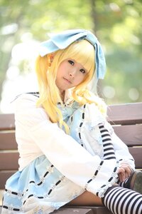 Rating: Safe Score: 0 Tags: 1girl bangs bench blonde_hair blurry blurry_background depth_of_field dress jewelry lips shinku sitting solo striped striped_legwear thighhighs User: admin