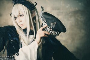 Rating: Safe Score: 0 Tags: 1girl bangs black_ribbon closed_mouth hairband holding long_hair long_sleeves ribbon solo suigintou upper_body watermark white_hair User: admin