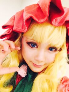 Rating: Safe Score: 0 Tags: 1girl bangs blonde_hair blue_eyes bow close-up hair_bow hat lips long_hair looking_at_viewer portrait red_bow shinku smile solo User: admin