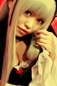 Rating: Safe Score: 0 Tags: 1girl bangs blonde_hair eyelashes flower lips long_hair looking_at_viewer nose realistic ribbon solo suigintou User: admin